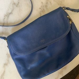 Fossil blue leather cross body bag.